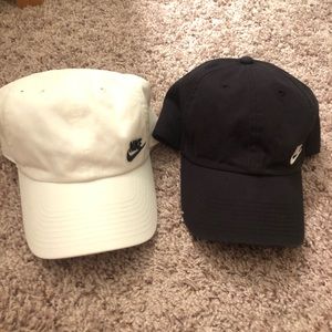 Black and white Nike baseball hats